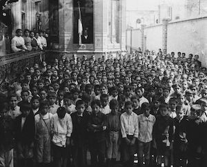 Students and teachers in the schoolyard during a ceremony, 1910, Fototeca Nacional, INAH (Instituto Nacional de Antropologia e Historia), Mexico